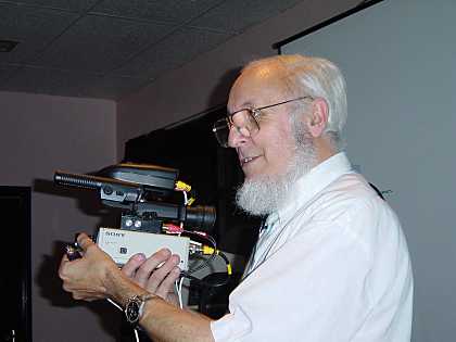 Paul holding a home constructed amateur
                             TV Camera based on a Video Sender.
