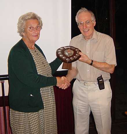 Ela presenting the G3PMX Trophy to Colin, G0TRM