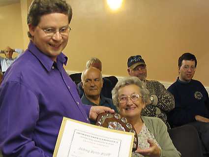 Anthony being presented with his Award