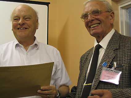 Denis being presented with his certificate