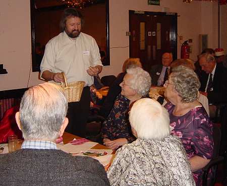 Chris reading the Raffle Prize number.