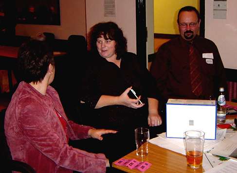 Rhona at her table with relatives