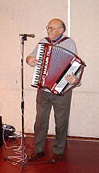 Tony. G4YTG with his organ leading a sing-song