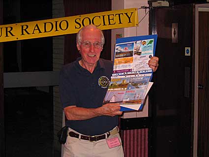 Colin showing the Special Event QSL Cards which made up his Award