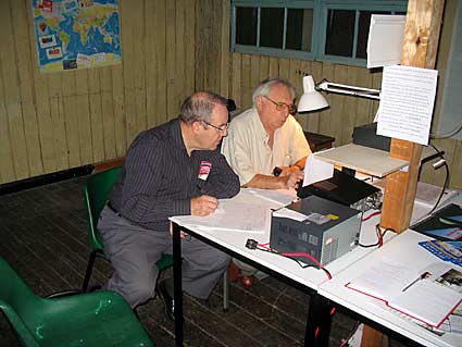 Malcolm on the microphone with Adrian logging